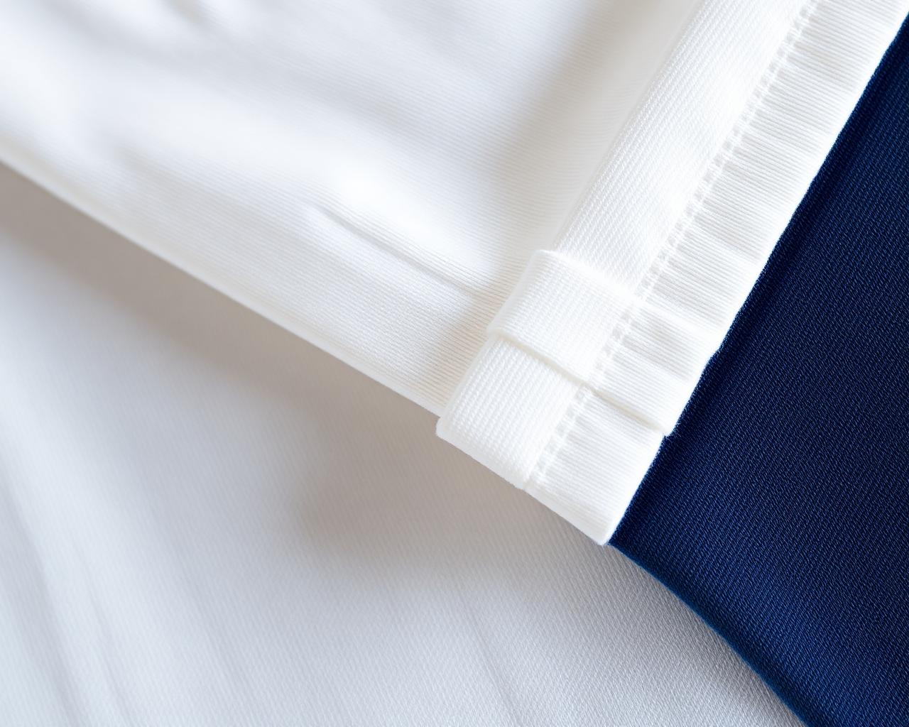 Macro close-up of premium cotton fabric and stitching